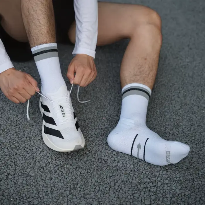 Chaussettes de course en plein air printemps automne homme femme Marathon reflètent la lumière cyclisme sport équipage chaussette