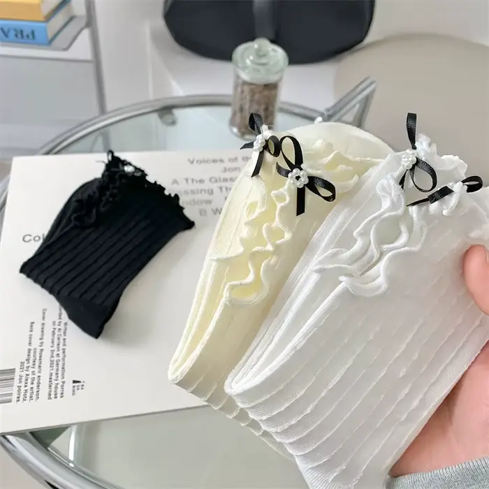 Chaussettes en dentelle avec nœud pour femmes