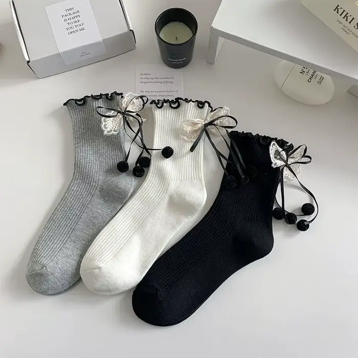 Chaussettes mi-tube en dentelle avec nœud pour femme