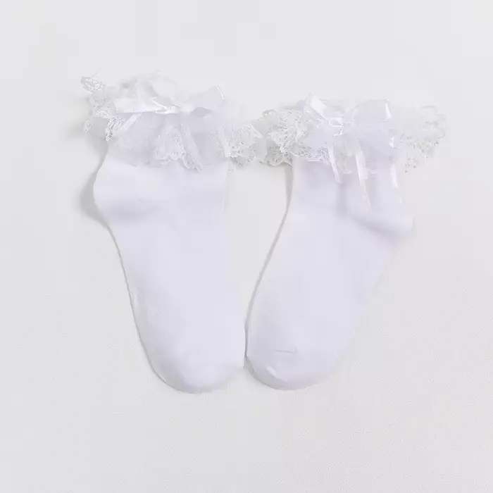 1 paire de chaussettes à volants pour femmes, chaussettes à volants noires et blanches avec bordure 