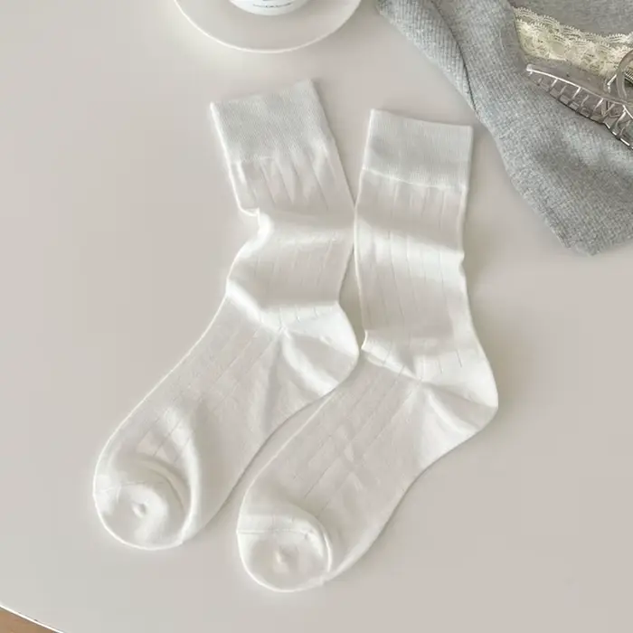 Chaussettes de couleur unie pour femmes, en Fiber de bambou, fines et respirantes, longues, élastiqu