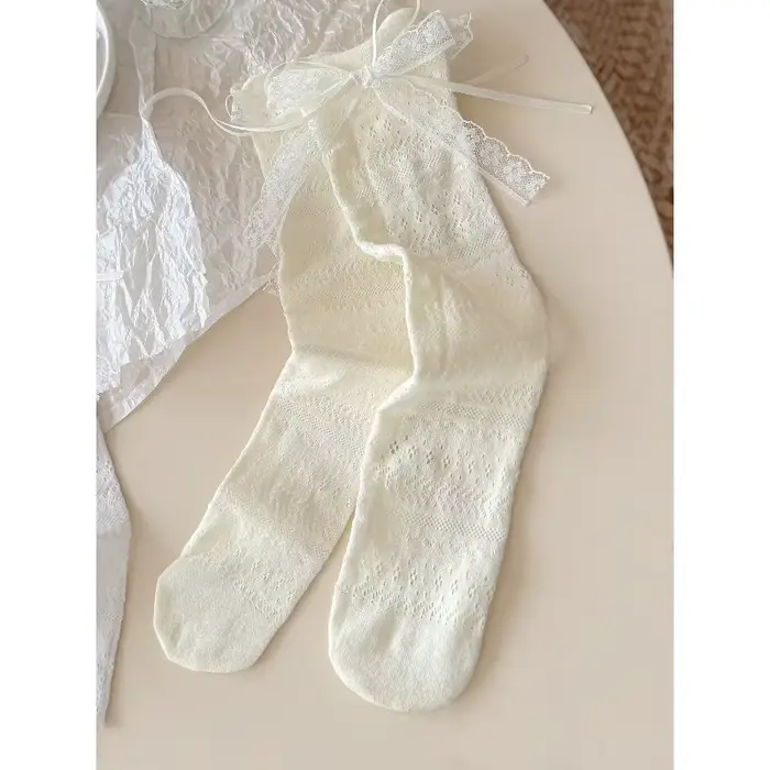 Chaussettes longues Lolita pour femmes, couleur unie, nouvelle mode printemps-été, chaussettes migno