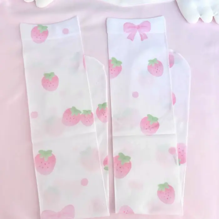 Chaussettes japonaises roses imprimées de dessins animés Kawaii pour femmes, chaussettes longues est